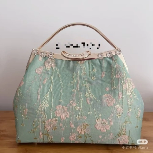 metal clasp purse frame with handle