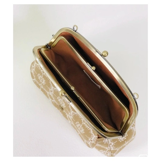 a metal purse clasp a metal purse clasp