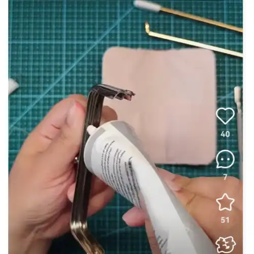  a metal purse clasp