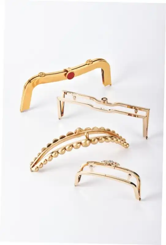 What materials are commonly used in metal clasp frame construction?