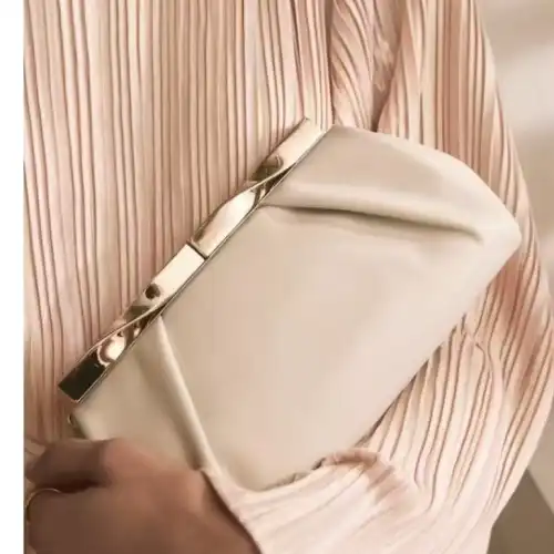 How to attach metal purse bag frame?